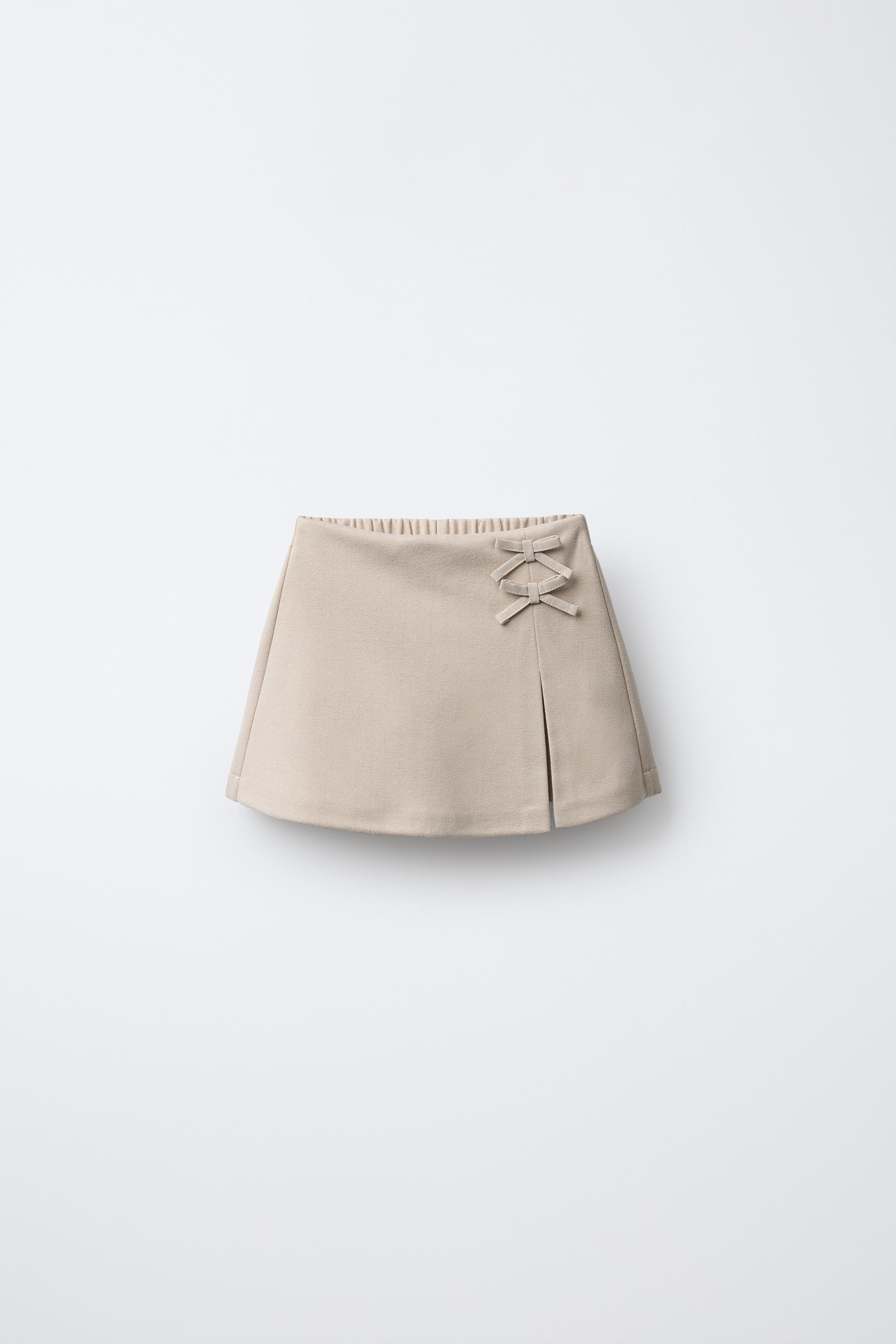 SOFT TOUCH SKORT WITH BOWS